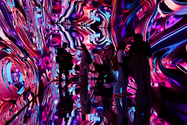 People visit the “Hyper Portal” installation by Michela Picchi, part of the Milan Design Week Fuorisalone exhibition, in Milan, Italy, on April 7, 2025. (Photo by Claudia Greco/Reuters)