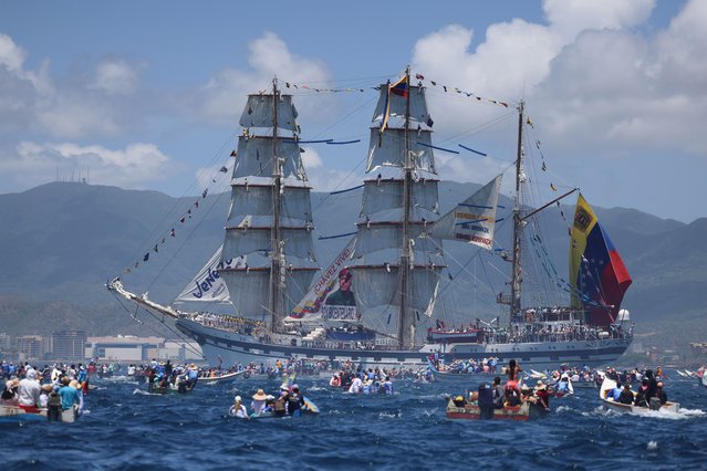 Participants aboard the Simon Bolivar training ship joins the maritime procession during the celebration of the Virgin of the Valley Day on Margarita Island, Venezuela, 08 September 2025. Most of the participants were fishermen steering their “peneros”, as small boats are known in the country, decorated for the occasion with flowers, balloons, flags, and altars featuring Marian images dressed in handmade garments. (Photo by Miguel Gutierrez/EPA)
