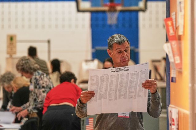 Workers prepare for voters at a poll site, in New York, Tuesday, November 4, 2025. (Photo by Richard Drew/AP Photo)