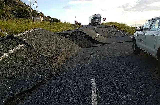 A handout photo taken and received on November 14, 2016, show earthquake damage to State Highway One near Oaro on the South Island's east coast. A powerful 7.8-magnitude earthquake killed two people and caused massive infrastructure damage in New Zealand, but officials said they were optimistic the death toll would not rise further.  The jolt, one of the most powerful ever recorded in the quake-prone South Pacific nation, hit just after midnight near the South Island coastal town of Kaikoura. (Photo by AFP Photo/APA/New Zealand Transport Agency)