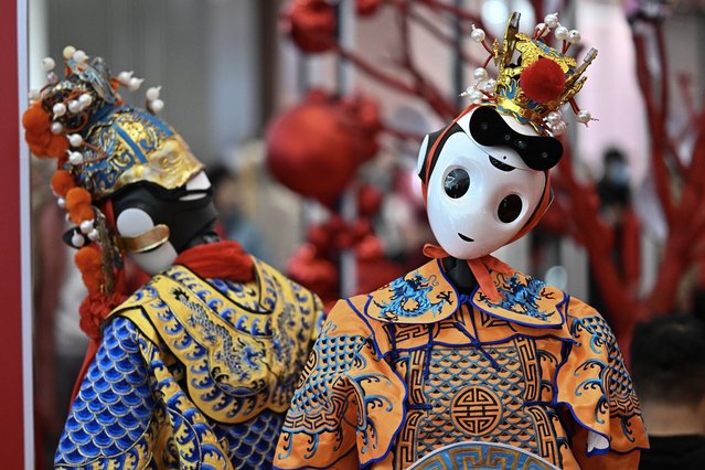 Robots are seen during the Spring Festival Science and Technology Temple Fair in Beijing on January 31, 2025. (Photo by Pedro Pardo/AFP Photo)