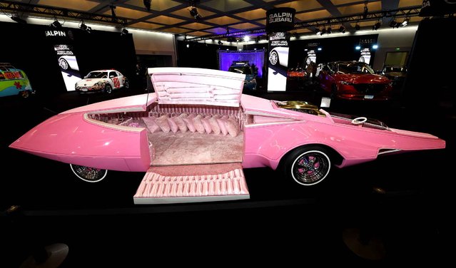 The fully restorted and functioning “Pink Panther Car” is displayed in the “Galpin Hall of Customs” at the Los Angeles Auto Show, November 17, 2016 in Los Angeles, California The Pink Panther Car was built by famed American designer George Barris who built many famous Hollywood custom cars, including the Munster Koach and 1966 Batmobile. The LA Auto Show’s consumer days will be open to the public, November 18-27. (Photo by Robyn Beck/AFP Photo)