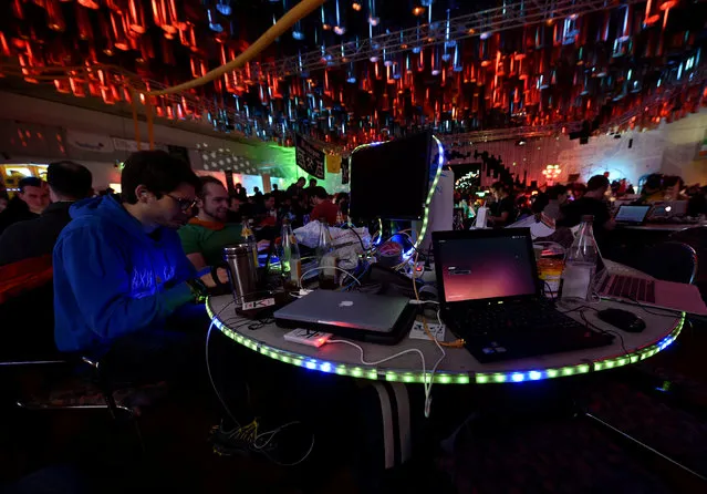 People use their computers during the 33th Chaos Communication congress, organized by the Chaos Computer Club, in Hamburg, Germany December 28, 2016. (Photo by Fabian Bimmer/Reuters)