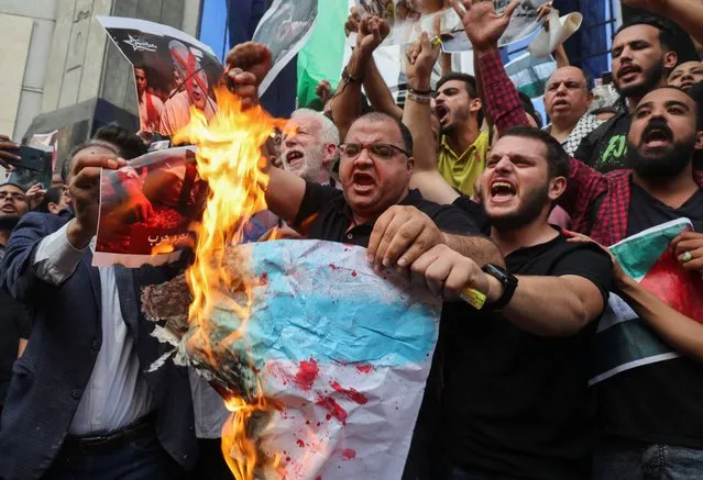 Egyptians shout slogans against Israel and the USA in support of Palestinians for those killed in a blast at Al-Ahli hospital in Gaza that Israeli and Palestinian officials blamed on each other, amid the ongoing conflict between Israel and Hamas, in Cairo, Egypt on October 18, 2023. (Photo by Amr Abdallah Dalsh/Reuters)
