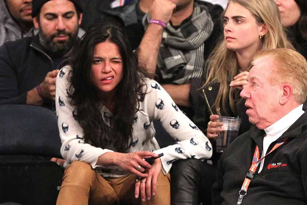 Michelle Rodriguez & Cara Delevigne Share Drunk Kiss at Knicks Game