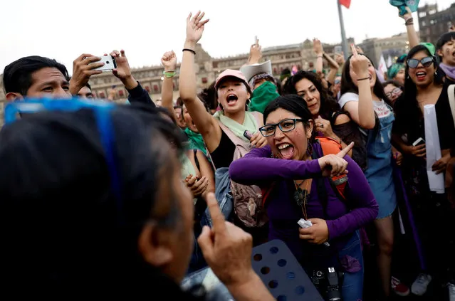 Women argue with faithfuls of the Evangelical church during a march on International Women's Day at Zocalo square in Mexico City, Mexico, March 8, 2019. (Photo by Edgard Garrido/Reuters)