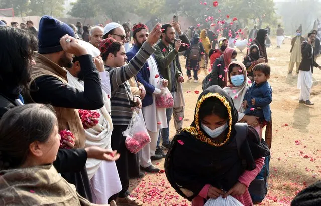 Families of missing persons, who have been protesting against enforced disappearances, leave after they called off their sit-in protest, in Islamabad, Pakistan, 24 January 2024. Baloch protesters, who had been camped outside Islamabad's National Press Club (NPC) since December 2023 to protest against enforced disappearances and extrajudicial killings, called off their sit-in following a request from the NPC to the Islamabad police for their removal. The letter was later withdrawn amid criticism, and the NPC clarified that it had always provided a platform to the protesters. The Human Rights Commission of Pakistan expressed solidarity with the protesters and highlighted concerns about efforts to uproot the camp. The protesters announced their decision to head back to Balochistan, emphasizing their struggle to address the issue of missing persons and criticizing the lack of attention from political parties during election campaigns. (Photo by Sohail Shahzad/EPA/EFE)