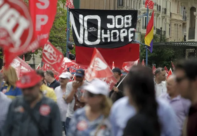 Demonstrators of Spain's leading trade unions CCOO and UGT march during May Day celebrations in Valencia, Spain, May 1, 2015. (Photo by Heino Kalis/Reuters)
