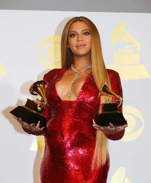 Beyonce holds the awards she won for Best Urban Contemporary Album for “Lemonade” and Best Music Video for “Formation” at the 59th Annual Grammy Awards in Los Angeles, California, U.S. , February 12, 2017. (Photo by Mike Blake/Reuters)