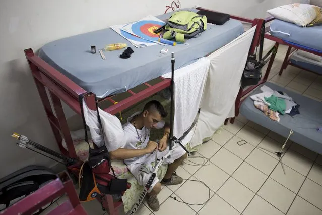 Kambeba Indian, Dream Braga, 18, is seen at the dormitory of a training centre in Manaus, Amazon state May 7, 2015. (Photo by Bruno Kelly/Reuters)