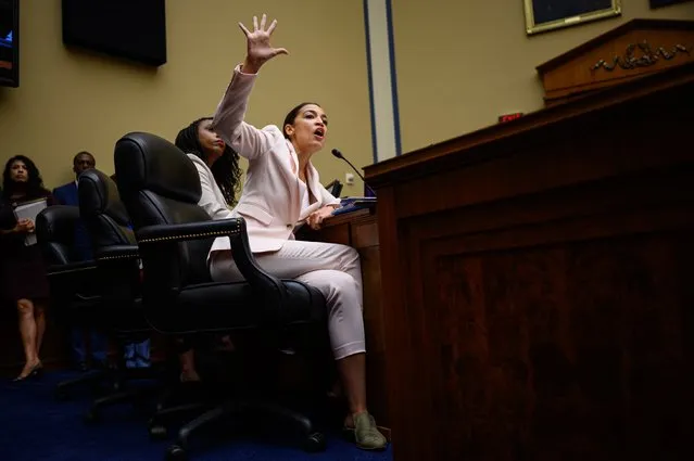 Rep. Alexandria Ocasio-Cortez (D-N.Y.), as the House Oversight and Reform Committee votes on holding Attorney General William P. Barr and Commerce Secretary Wilbur Ross in contempt for failing to cooperate in their investigation of Trump administration’s efforts to add citizenship question to 2020 Census on June 12, 2019. (Photo by Salwan Georges/The Washington Post)