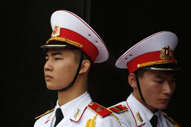 Vietnamese soldiers stand guard while North Korean leader Kim Jong Un attends wreath laying ceremony at Ho Chi Minh Mausoleum in Hanoi, Vietnam Saturday, March 2, 2019. (Photo by Jorge Silva/Pool Photo via AP Photo)