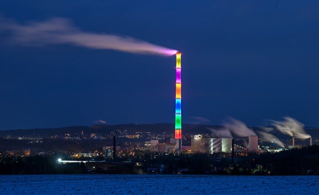 Smoke rises from the Chemnitz thermal power station in the second decade of January 2024 in Saxony, east Germany, which is about to be shut down. The 302m-high chimney, painted by the French artist Daniel Buren, will be preserved. (Photo by Hendrik Schmidt/Avalon)