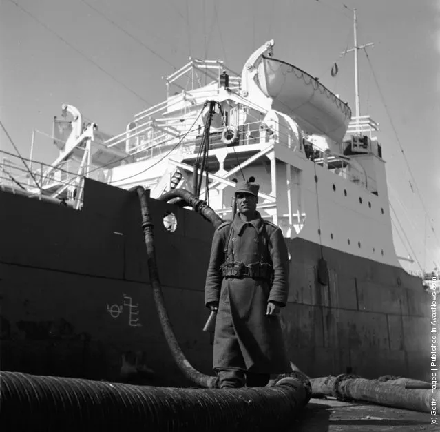 1955:  A Persian soldier guarding an oil production site belonging to the Iranian oil company at Abadan on the northern tip of the Persian Gulf