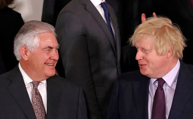 U.S. Secretary of State Rex Tillerson (L) and British Foreign Secretary Boris Johnson take part in a meeting of NATO foreign ministers at the Alliance's headquarters in Brussels, Belgium March 31, 2017. (Photo by Yves Herman/Reuters)