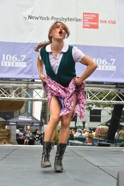 Holly Heiser of Fuerza Bruta performs at 106.7 Lite FM's Broadway In Bryant Park 2015 at Bryant Park on July 9, 2015 in New York City. (Photo by Theo Wargo/Getty Images)