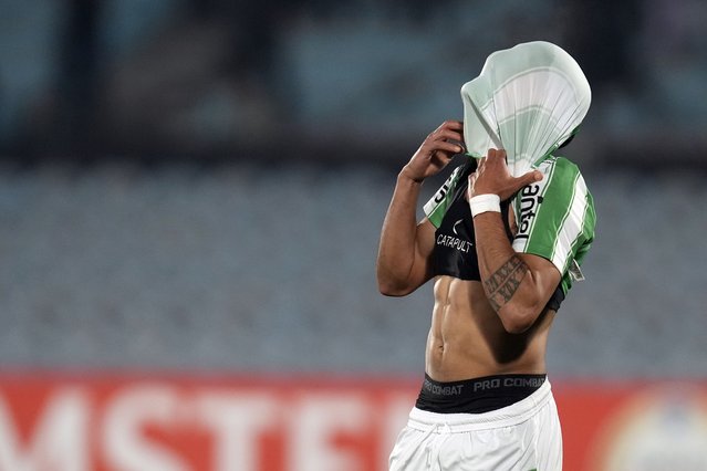 Lucas Rodriguez of Uruguay's Racing reacts after missing a penalty during a Copa Sudamericana playoffs soccer match against Chile's Huachipato at Centenario stadium in Montevideo, Uruguay, Tuesday, July 23, 2024. (Photo by Matilde Campodonico/AP Photo)