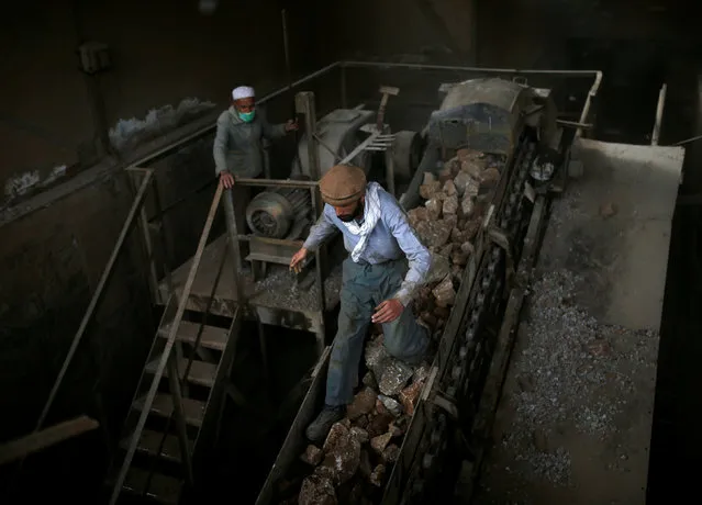 Men work at the Jabal Saraj cement factory in Jabal Saraj, north of Kabul, Afghanistan April 19, 2016. (Photo by Ahmad Masood/Reuters)