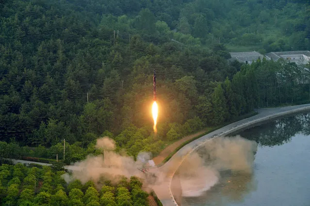 This undated photo released by North Korea's official Korean Central News Agency (KCNA) on May 30, 2017 shows a test-fire of a ballistic missile at an undisclosed location in North Korea. (Photo by AFP Photo/KCNA via KNS)