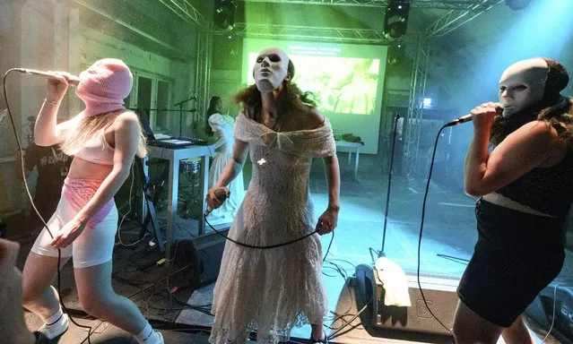 (L-R) Diana Burkot, Maria Alyokhina and Olga Borisova perform at the concert of the anti-cremlin and feminist band p*ssy Riot at Funkhaus Berlin on May 12, 2022. The 33-year-old Alyokhina had only recently fled Russia. Based on the book “Riot Days” by Alyokhina, the “p*ssy Riot Anti-War Tour” presented a performance project consisting of music, theater and video recordings. 19 performances have been announced for the tour. The punk band has been a thorn in the side of the Russian government for years. (Photo by Bernd von Jutrczenka/dpa)