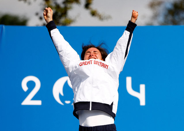 Gold medallist Sarah Storey of Britain celebrates on the podium after the women's C5 individual road cycling time trails in Clichy-sous-Bois, France on September 4, 2024. (Photo by Maria Abranches/Reuters)