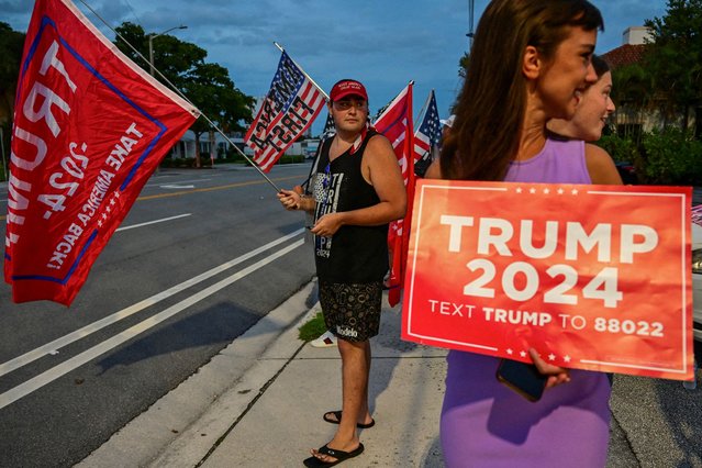 Supporters of Republican presidential nominee and former U.S. President Donald Trump gather around Mar-A-Lago, after he returned from Trump International Golf Club, which was the site of a shooting, to his residence at Mar-A-Lago, in Palm Beach, Florida, U.S. September 15, 2024. (Photo by Giorgio Viera/Reuters)