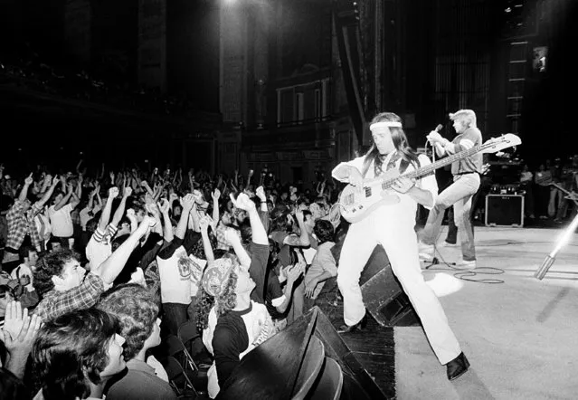 The rock group Molly Hatchet performs for 2,500 Pittsburgh rock fans at a benefit concert for steelworkers' food bank in Pittsburgh, Pa., June 2, 1983.  Playing the bass guitar is Riff West, and behind him is Danny Joe Brown.  Officials say $16,000 was raised to help feed jobless members of the United Steelworkers Local 1397 in Homestead, Pennsylvania. (Photo by Gene J. Puskar/AP Photo)