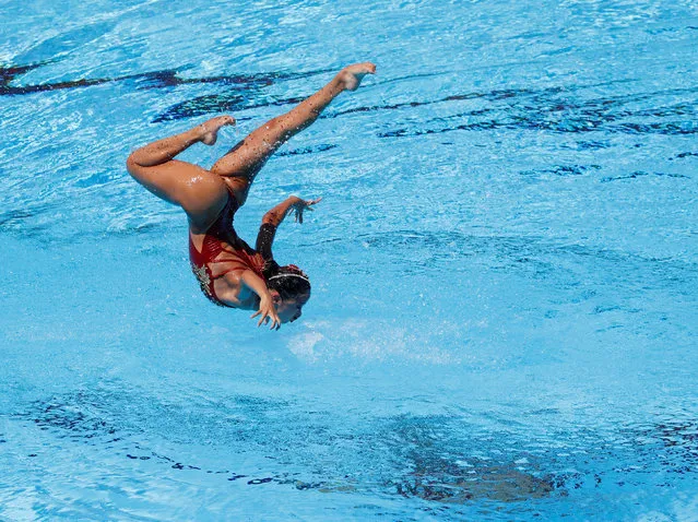 This picture taken with an underwater camera shows Japan' s Yumi Adachi competing in the Mixed Duet technical final during the synchronised swimming competition at the 2017 FINA World Championships in Budapest, on July 17, 2017. (Photo by Bernadett Szabo/Reuters)