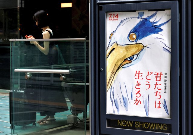 A movie poster of Oscar-winning Japanese animation master Hayao Miyazaki’s last film “How Do You Live?” (Kimitachi wa Do Ikiru Ka?) outside a movie theatre in Tokyo, Japan on July 14, 2023. (Photo by Kim Kyung-Hoon/Reuters)