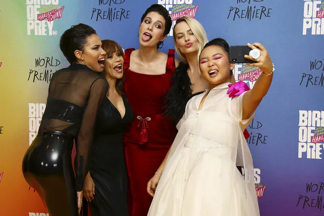 Actresses from left Jurnee Smollett-Bell, Rosie Perez, Mary Elizabeth Winstead, Margot Robbie and Ella Jay Basco pose for a selfie photo upon arrival at the world premiere of “Birds of Prey” in London, Wednesday, January 29, 2020. (Photo by Joel C. Ryan/Invision/AP Photo)