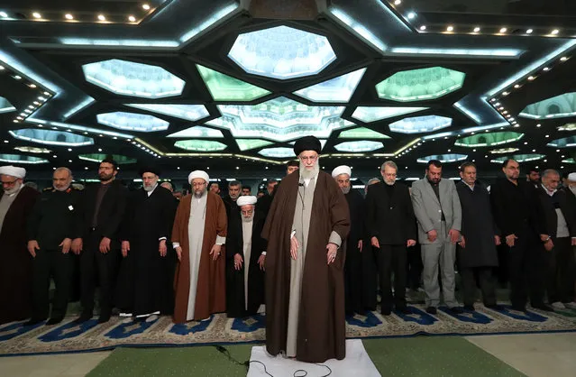 A handout photo made available by Iran's Supreme Leader Office shows Iranian Supreme Leader Ayatollah Ali Khamenei (C) leading a Friday prayer ceremony in Tehran, Iran, 17 January 2020. The supreme leader delivered a sermon where he commented on the nuclear deal and the ongoing tensions with the United States, media reported. (Photo by Iran's Supreme Leader Office/EPA/EFE)