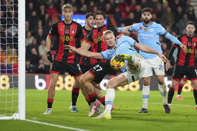 Manchester City's Erling Haaland hits a rebound against the post during the English Premier League soccer match between Bournemouth and Manchester City at the Vitality stadium in Bournemouth, England, Saturday, November 2, 2024, Bournemouth won the game 2-1. (Photo by Kirsty Wigglesworth/AP Photo)