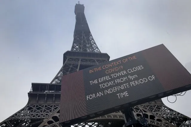 A sign informing people that the Eiffel Tower is closed is displayed on March 14, 2020 in Paris, France. In accordance with directives issued by French governement, the Eiffel Tower is closed until further notice. Due to a sharp increase in the number of cases of coronavirus (COVID-19) declared in Paris and throughout France, several sporting, cultural and festive events have been postponed or canceled. The epidemic has exceeded 5,000 dead for more than 137,000 infections across the world. (Photo by Chesnot/Getty Images)