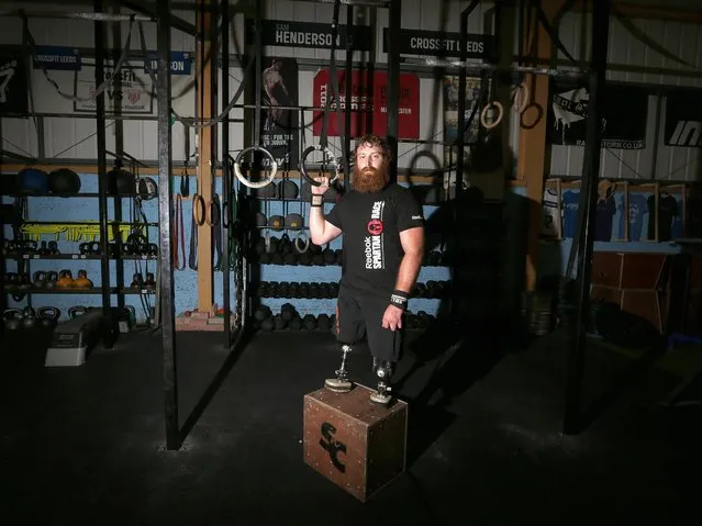 Stevie Richardson, 26, from Edinburgh, trains at CrossFit, Leeds, ahead of taking part in the Spartan Race event, on August 10, 2014. (Photo by Lynne Cameron/PA Wire)