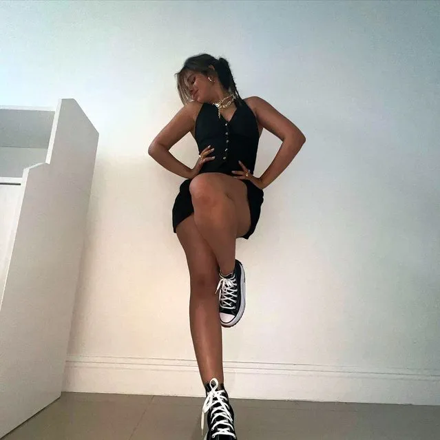 Cuban-American singer-songwriter Camila Cabello showed off her edgy side in a new Instagram pic in the second decade of August 2022. The singer sported a black dress, silver chain jewelry and Converse kicks as she posed for the camera. (Photo by camila_cabello/Instagram)