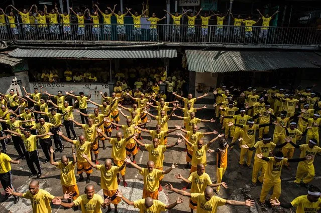 Inmates participate in a group dance contest inside the Quezon City Jail in Manila in this picture taken on July 18, 2016. (Photo by Noel Celis/AFP Photo)