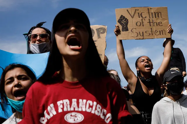 Protesters chant in front of the Fremont Police Department, where they rallied to protest police brutality on Tuesday, June 2, 2020 in Fremont, Calif., on the fifth day of protests over George Floyd's death by the Minneapolis police. (Photo by Dai Sugano/Bay Area News Group)