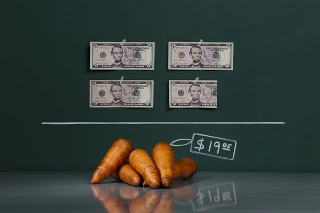 A kilogram (2.2 lbs) of raw carrots as photographed in a studio with an illustrative price tag of $19.05 (US dollars), equivalent to the Bs. 120 (bolivars) that it costs on average to purchase in Caracas at the official exchange rate of 6.3 bolivars per dollar, in Caracas September 29, 2014. (Photo by Carlos Garcia Rawlins/Reuters)