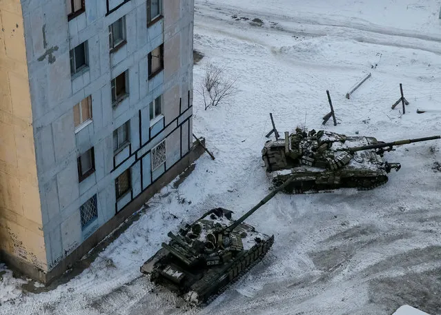 Tanks are seen in the government-held industrial town of Avdiyivka, Ukraine, February 1, 2017. (Photo by Gleb Garanich/Reuters)