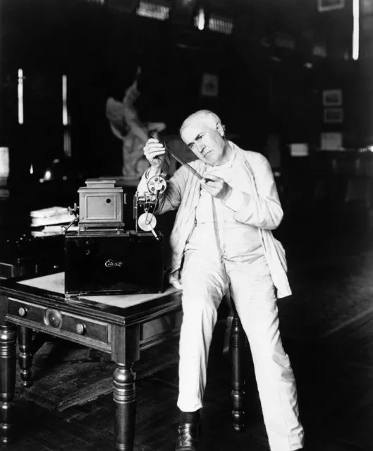 Inventor Thomas A. Edison examines film, October 6, 1889. (Photo by AP Photo)