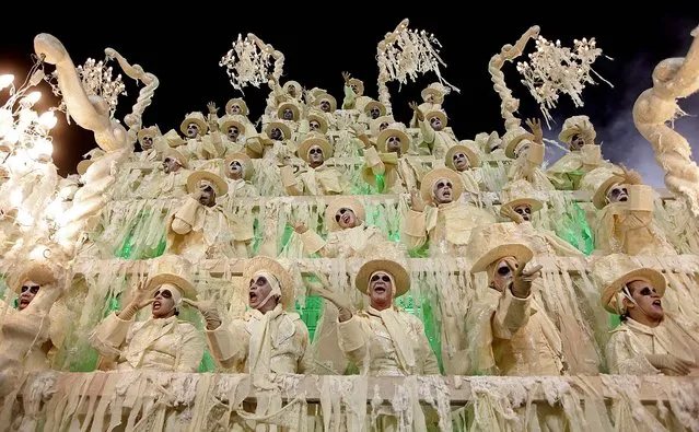 Performers from the Unidos da Tijuca samba school parade during carnival celebrations at the Sambadrome in Rio de Janeiro.  (Photo by Hassan Ammar/Associated Press)