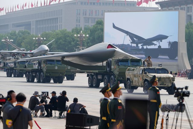 Military equipment passes during the military parade to commemorate the 80th anniversary of Japan's World War II surrender held in front of Tiananmen Gate in Beijing, Wednesday, September 3, 2025. (Photo by Ng Han Guan/AP Photo)
