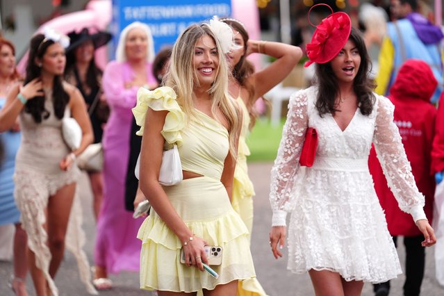 Racegoers arrive on ladies day of The Betfred Derby Festival at Epsom Downs Racecourse, UK on Friday, May 31, 2024. (Photo by Mike Egerton/PA Images via Getty Images)