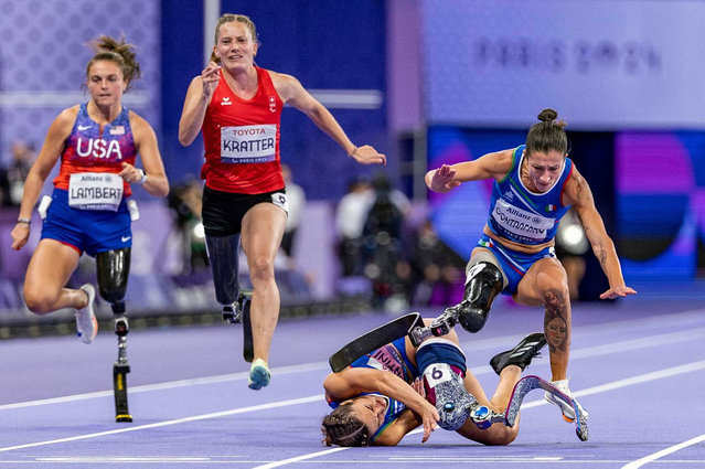 Ambra Sabatini (ITA) and Monica Graziana Contrafatto (ITA) fall at the finish line ahead of Elena Kratter (SUI) and Noelle Lambert (USA) in the Para Athletics Women’s 100m -T63 Final during the Paris 2024 Paralympic Summer Games at Stade de France, on September 7, 2024. (Photo by Adrian Dennis/OIS via Imagn Images)