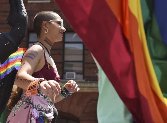 Parkland, Florida, school shooting survivor Emma Gonzales attends the 2018 New York City Pride Parade on June 24, 2018 as participants make their way down 7th Avenue in New York. (Photo by Timothy A. Clary/AFP Photo)