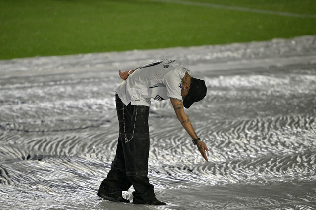 Brazilian football star Neymar reacts during his presentation as a new player of the Santos football team at the Urbano Caldeira Stadium in Santos, Sao Paulo state, Brazil on January 31, 2025. Star Neymar signed on Friday a “six-month” contract with Santos of Brazil, the club that formed him and to which he returns after his disappointing spell in Arabian soccer, according to the vice president of the Sao Paulo state team. (Photo by Nelson Almeida/AFP Photo)