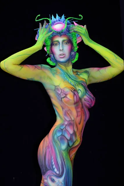 A model, painted by bodypainting artist Kristina Komarowa from russia, poses for a picture at the 21st World Bodypainting Festival 2018 on July 14, 2018 in Klagenfurt, Austria. (Photo by Didier Messens/Getty Images)