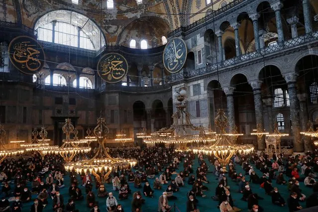 Worshippers pray on the first Friday of Ramadan at Ayasofya-i Kebir Camii or Hagia Sophia Grand Mosque in Istanbul, Turkey on April 16, 2021. (Photo by Murad Sezer/Reuters)