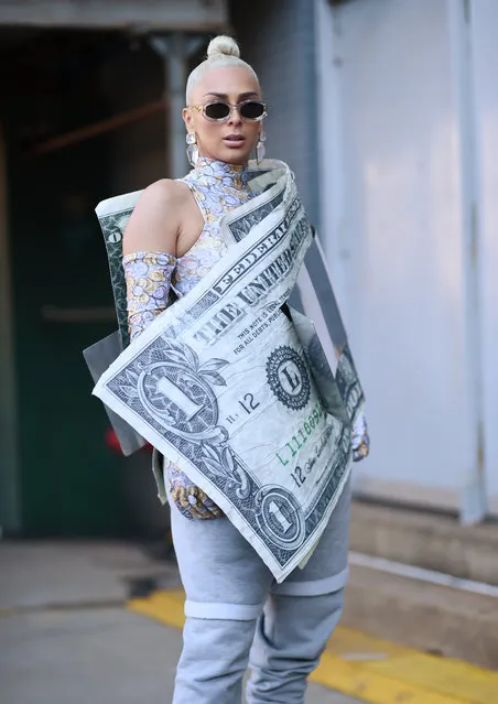 A guest is seen wearing a money clip outfit outside the Taoray Wang show during New York Fashion Week: Fall/Winter 2019 on February 09, 2019 in New York City. (Photo by Daniel Zuchnik/Getty Images)