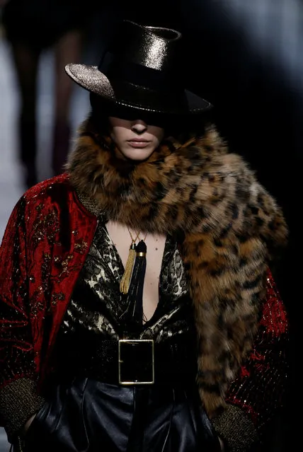 A model presents a creation by designer Anthony Vaccarello as part of his Fall/Winter 2019-2020 women's ready-to-wear collection for fashion house Saint Laurent during Paris Fashion Week in Paris, France, February 26, 2019. (Photo by Regis Duvignau/Reuters)